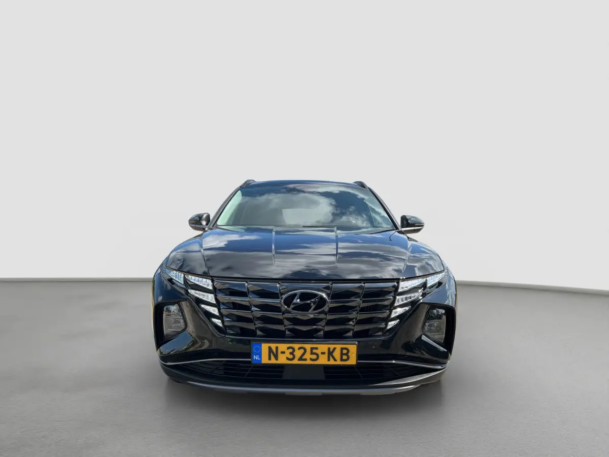 1.6 T-GDI 230pk HEV Comfort | Camera | Carplay | Elektrische spiegels | Keyless entry | Trekhaak | LED koplampen | Navigatie | Parkeersensoren | Stoelverwarming