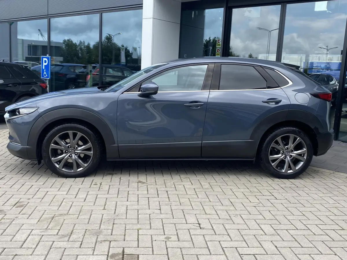 2.0 e-SkyActiv-X M Hybrid Luxury | TREKHAAK | LEDER | MEMORYSTOELEN | HEAD UP DISPLAY | BOSE | STOELVERWARMING | CAMERA | NAVIGATIE | LMV | ADAPTIEF CRUISECONTROL |
