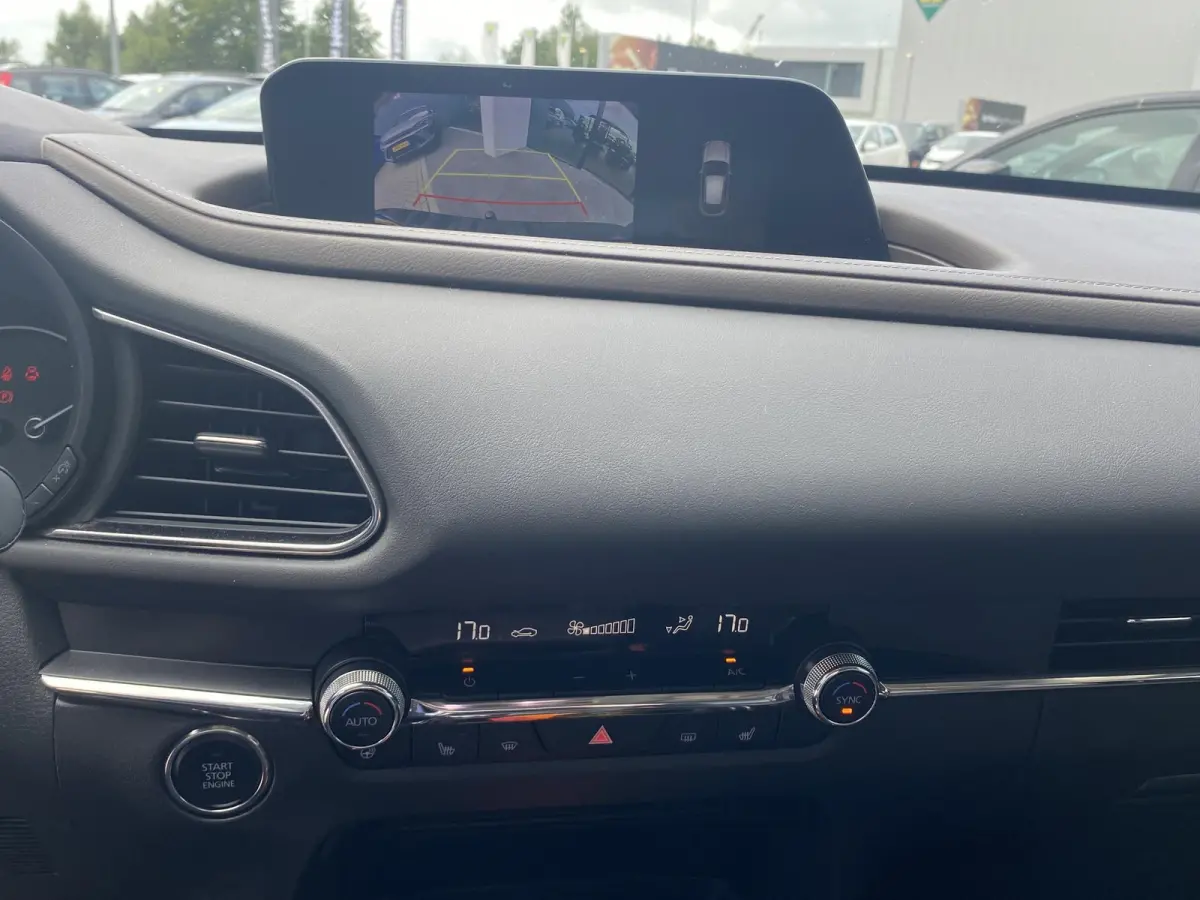 2.0 e-SkyActiv-X M Hybrid Luxury | TREKHAAK | LEDER | MEMORYSTOELEN | HEAD UP DISPLAY | BOSE | STOELVERWARMING | CAMERA | NAVIGATIE | LMV | ADAPTIEF CRUISECONTROL |