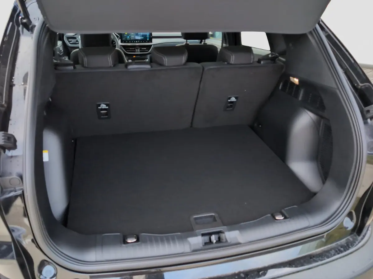 Plug-In Hybrid Titanium | TREKHAAK | WINTERPAKKET | ADAPTIEVE CRUISE CONTROL | DRAADLOZE CARPLAY | Achteruitrijcamera | Adaptieve Cruise Control | Agate Black Metallic