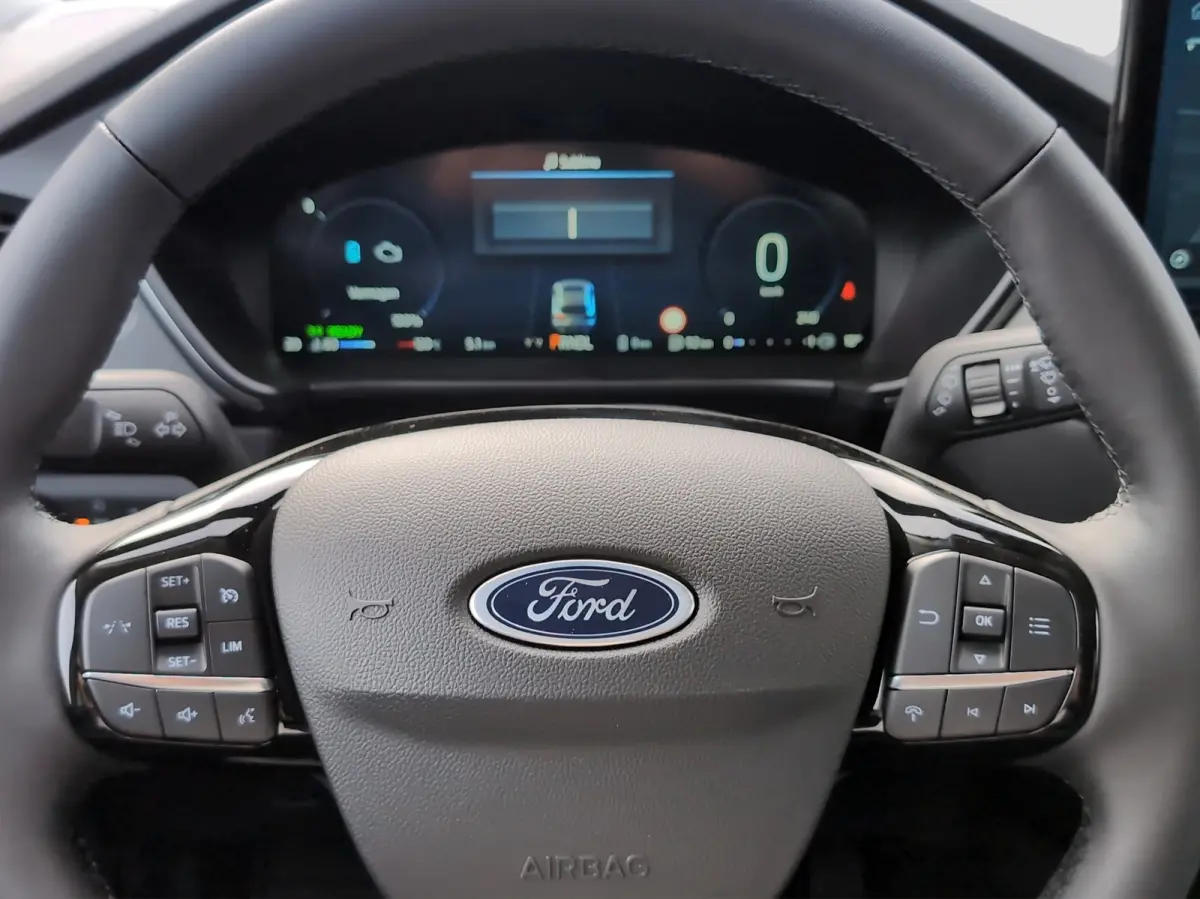 Plug-In Hybrid Titanium | TREKHAAK | WINTERPAKKET | ADAPTIEVE CRUISE CONTROL | DRAADLOZE CARPLAY | Achteruitrijcamera | Adaptieve Cruise Control | Agate Black Metallic