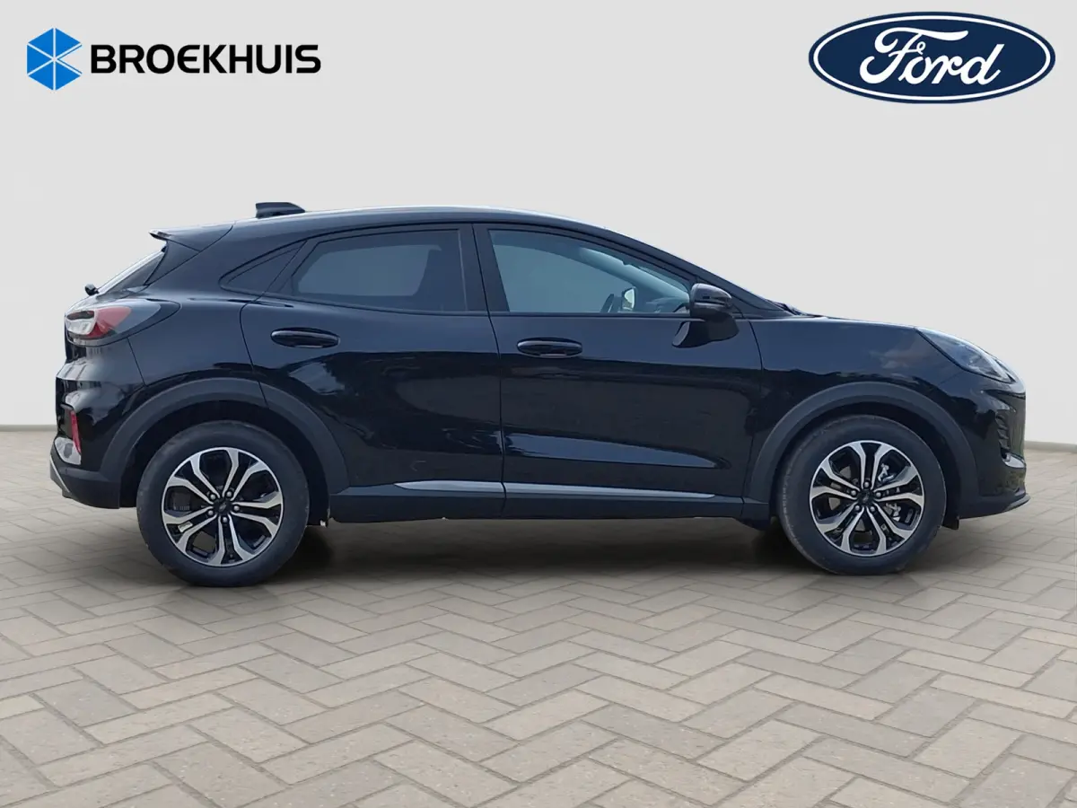 Titanium | WINTER PAKKET | CAMERA | ELEKTRISCHE ACHTERKLEP | DRAADLOZE CARPLAY | Achteruitrijcamera | Agate Black Metallic | Elektrisch bedienbare achterklep
