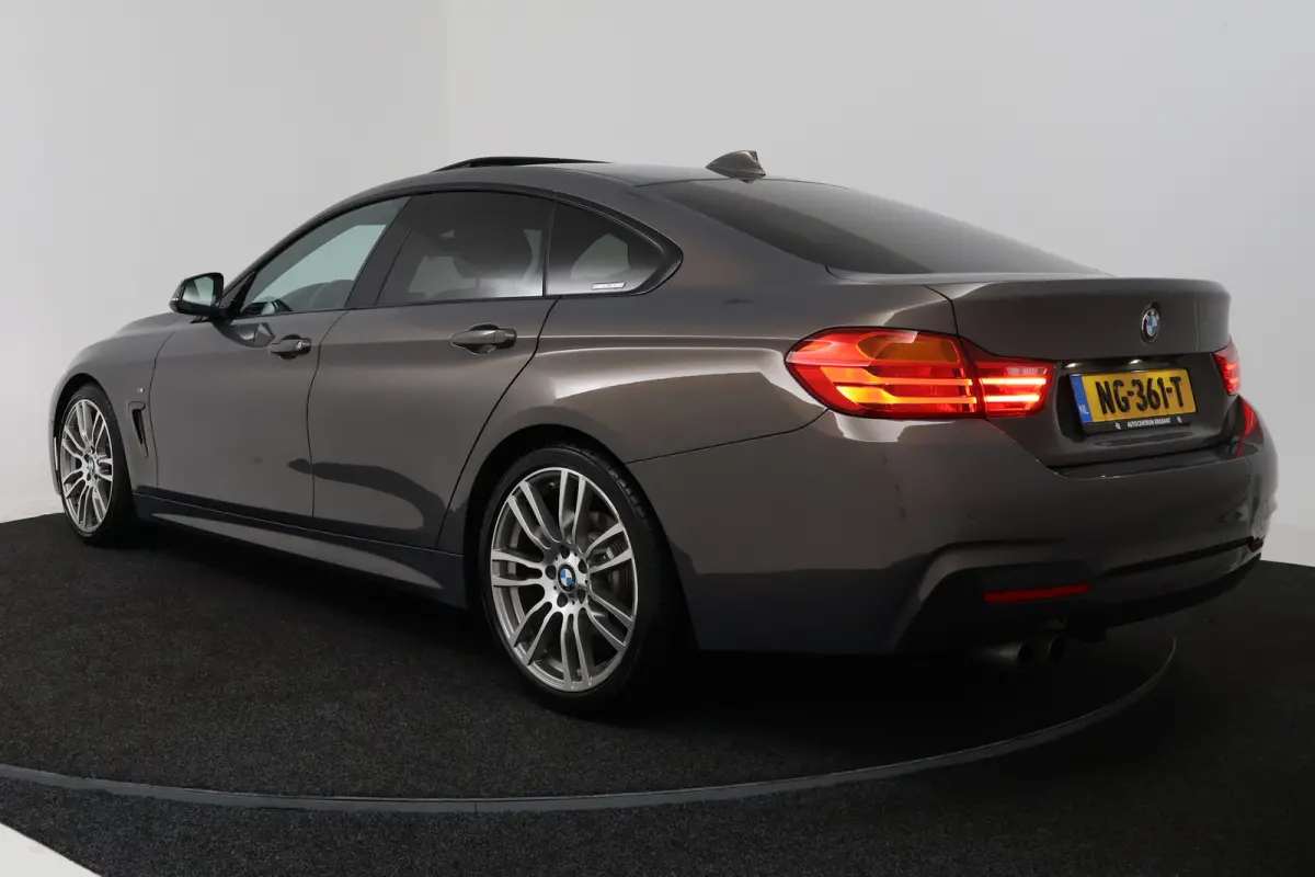 420i Centennial High Executive (PANORAMADAK, STOELVERWARMING, ADAPTIVE CRUISE, HEAD-UP, 360 CAMERA)