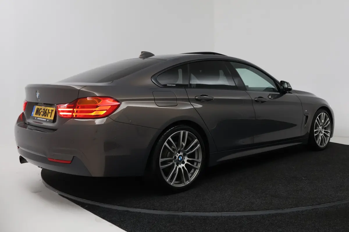420i Centennial High Executive (PANORAMADAK, STOELVERWARMING, ADAPTIVE CRUISE, HEAD-UP, 360 CAMERA)