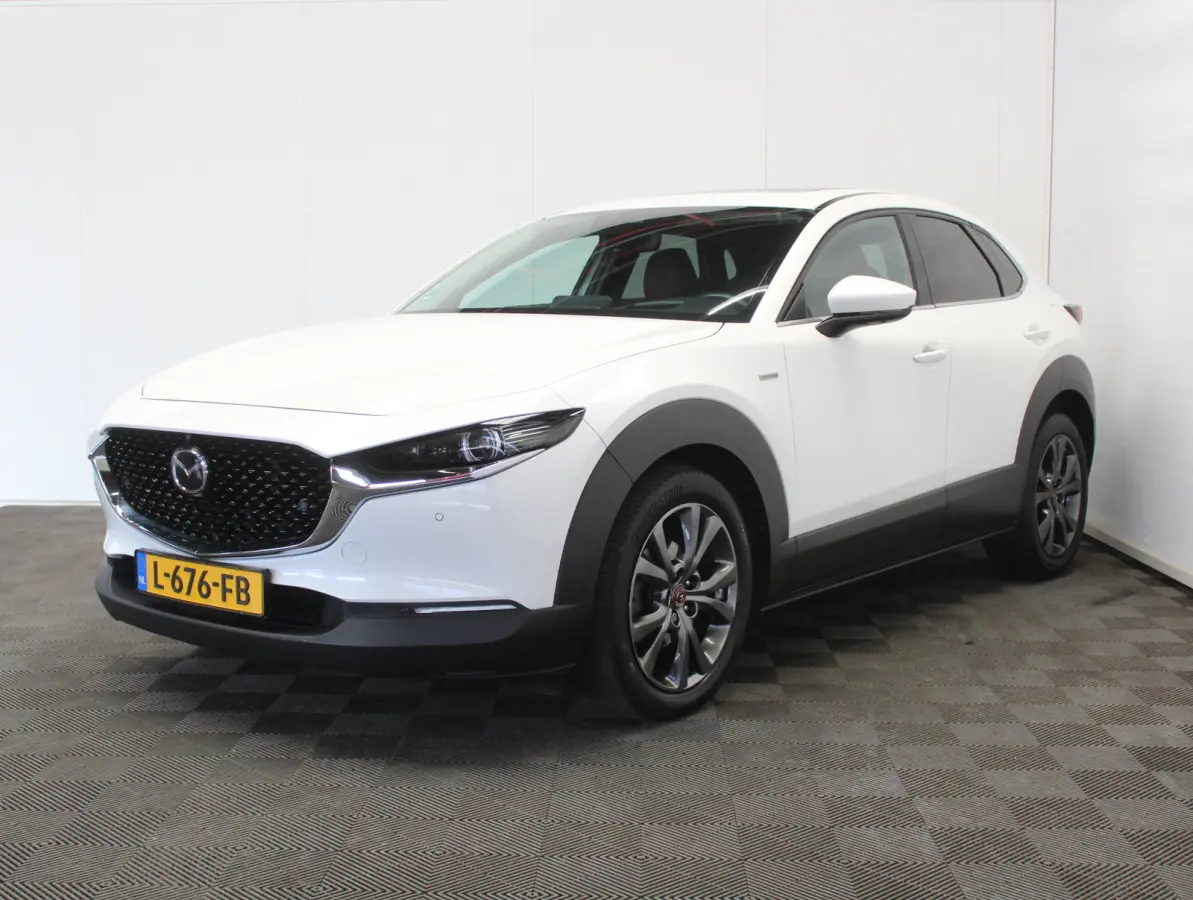 2.0 e-SkyActiv-X M Hybrid 100th Anniversary Ed. CLIMATE | ADAPCRUISE | HEAD-UP | 360CAMERA | STOELMEM | STUUR/STOELVERW | DAB | LMV18 | LEER | LED | CARPLAY