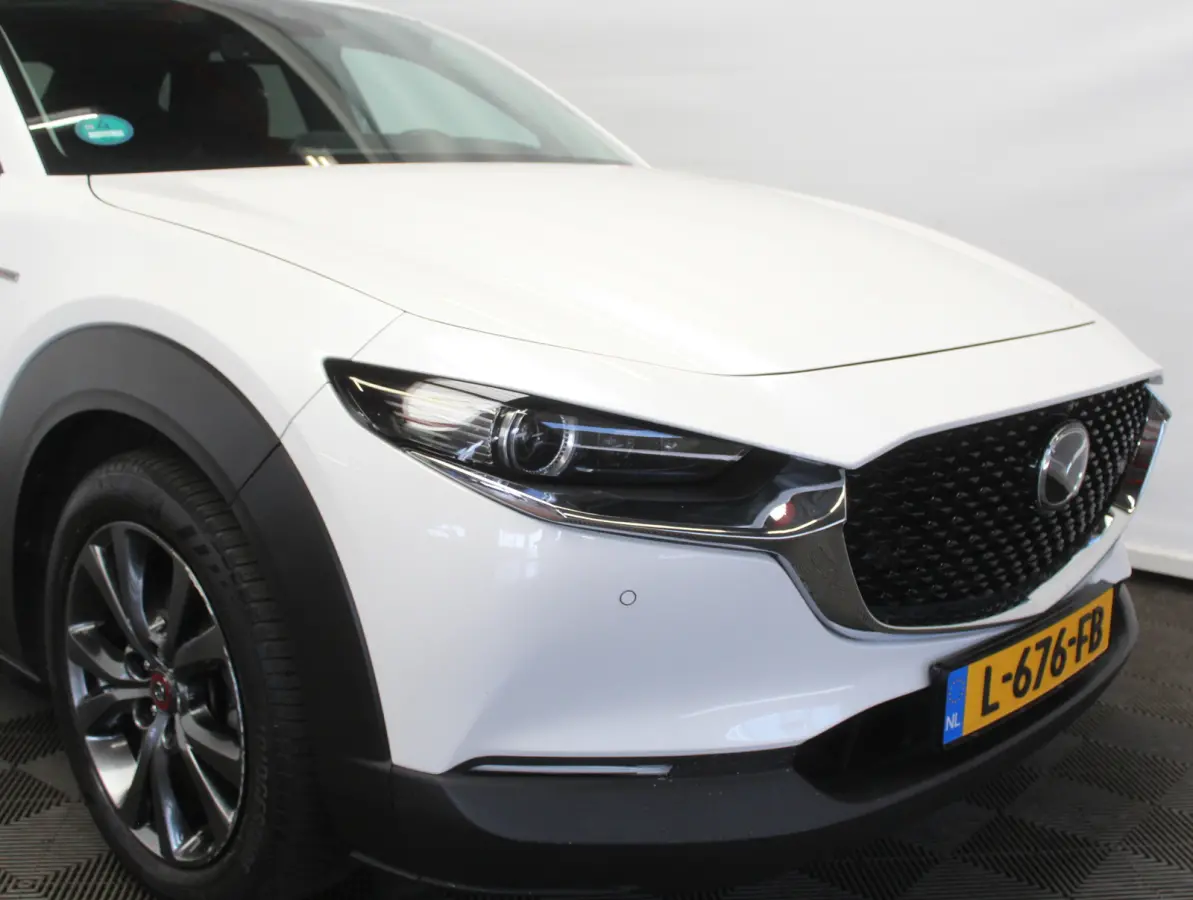2.0 e-SkyActiv-X M Hybrid 100th Anniversary Ed. CLIMATE | ADAPCRUISE | HEAD-UP | 360CAMERA | STOELMEM | STUUR/STOELVERW | DAB | LMV18 | LEER | LED | CARPLAY