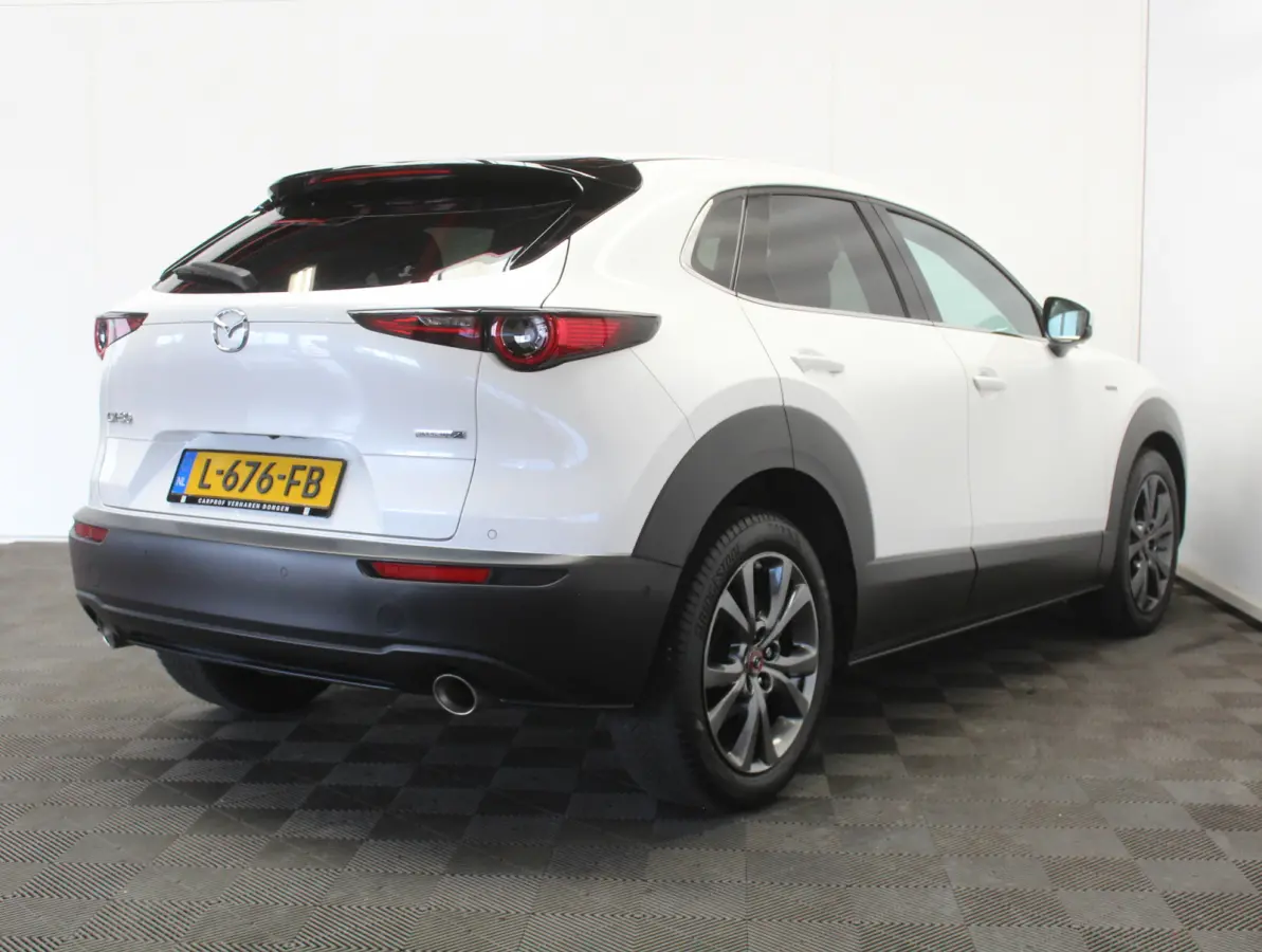 2.0 e-SkyActiv-X M Hybrid 100th Anniversary Ed. CLIMATE | ADAPCRUISE | HEAD-UP | 360CAMERA | STOELMEM | STUUR/STOELVERW | DAB | LMV18 | LEER | LED | CARPLAY