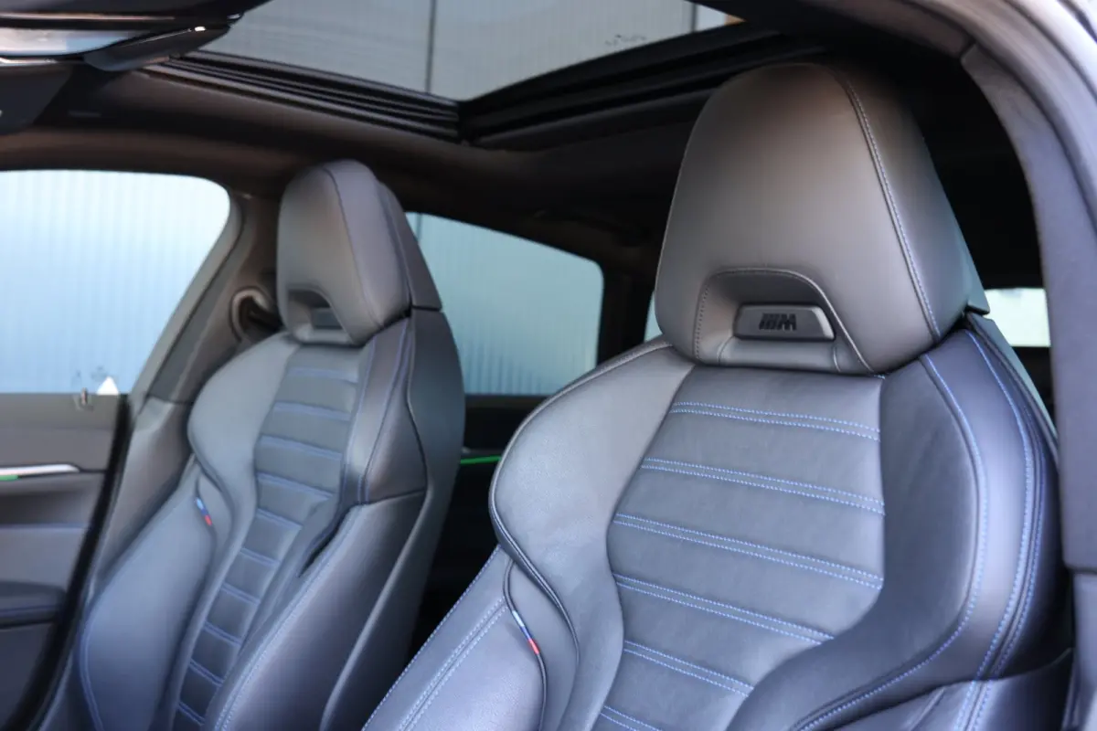 M50 High Executive M-sport | schuifkanteldak | m-sport seats | individual frozen | adap. cruise | carbon | harmankardon