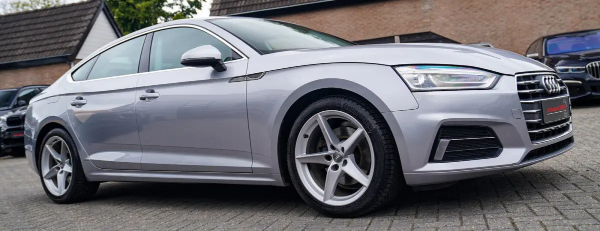 2.0 TFSI MHEV Sport | Navigatie | Elektrisch bedienbare achterklep | Multifunctioneel stuurwiel | Cruise control