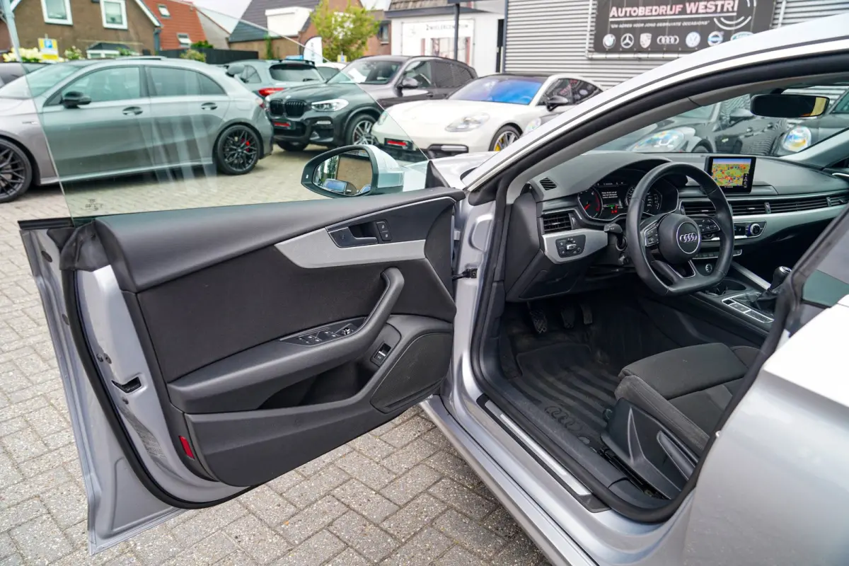 2.0 TFSI MHEV Sport | Navigatie | Elektrisch bedienbare achterklep | Multifunctioneel stuurwiel | Cruise control