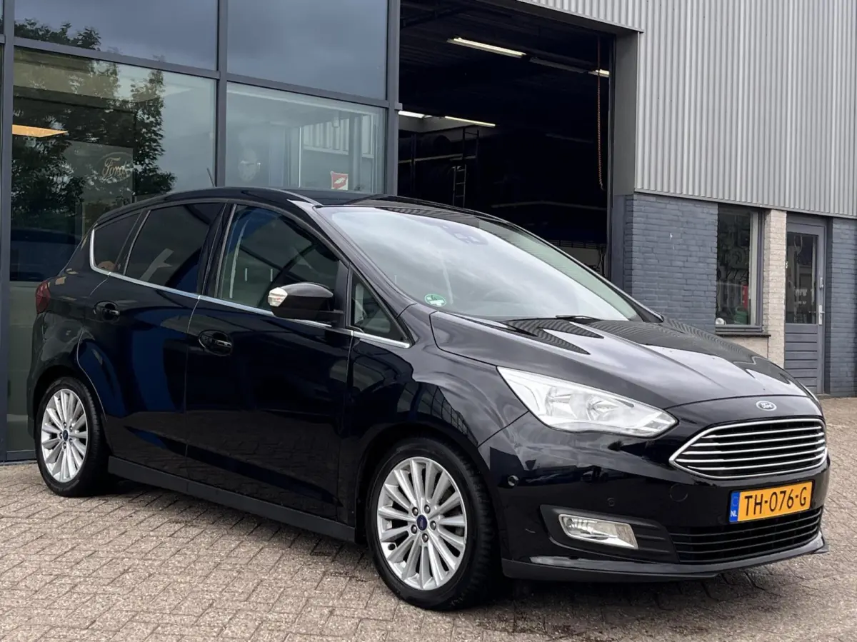 1.0 Titanium 125PK Camera Voorruitverwarming Carplay Cruise Control Climate Navi Parkeersensoren *Dealer Onderhouden*