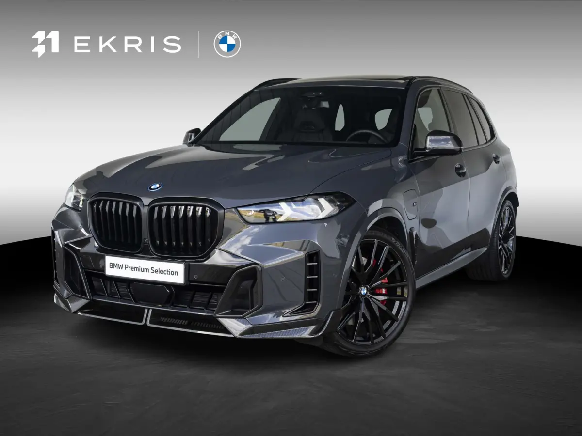 xDrive50e | M Sportpakket Pro | M Performance Carbon | Travel Pack | 22 inch | Active Steering | Glazen panoramadak Sky Lounge | Driving Assistent Professional | Bowers & Wilkins | Trekhaak