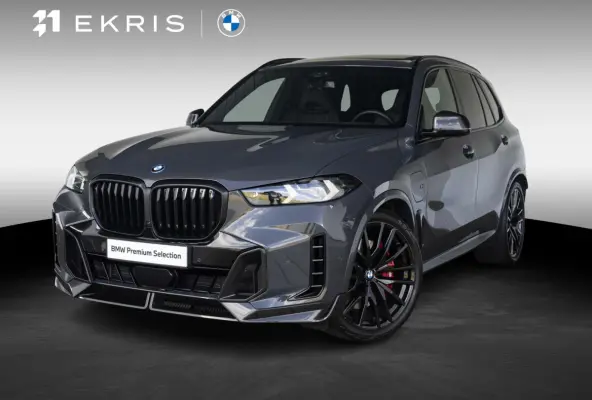 xDrive50e | M Sportpakket Pro | M Performance Carbon | Travel Pack | 22 inch | Active Steering | Glazen panoramadak Sky Lounge | Driving Assistent Professional | Bowers & Wilkins | Trekhaak