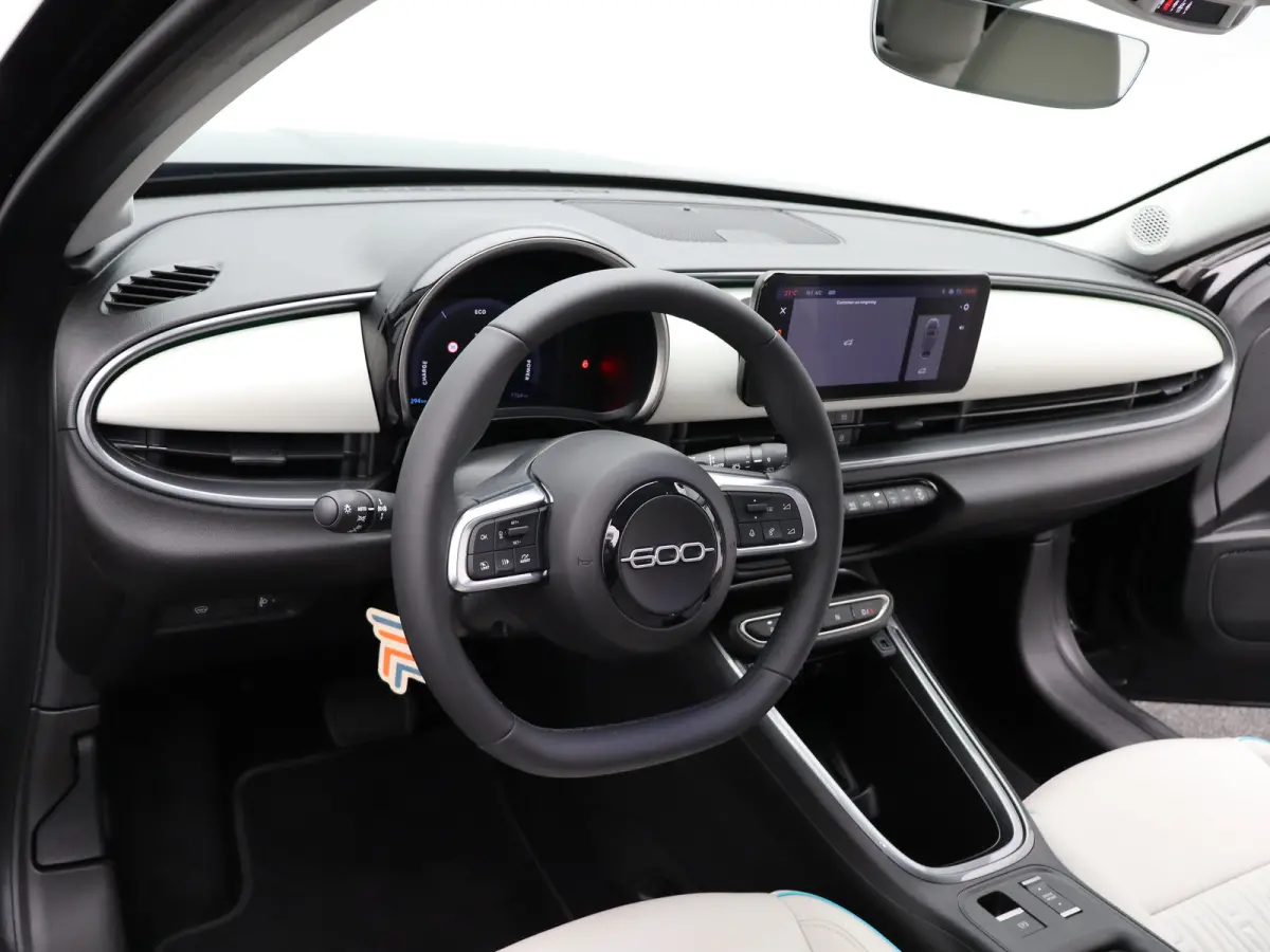 La Prima 54 kWh | SOH 98% | Keyless | Dodehoekdetectie | Navi | Stoelverwarming | 18"LMV | Camera | Cruise | Clima | Carplay |