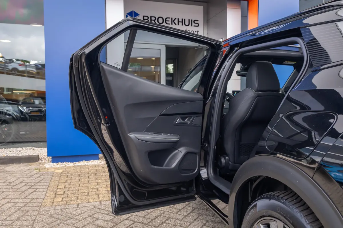 EV GT Pack 50 kWh | (Elektrisch) panorama-dak | Cruise adaptief | Camera | Apple Carplay/Android Auto | Lederen/alcantara bekleding | Stoel verwarming | Keyless | Digitaal dashboard | Achter