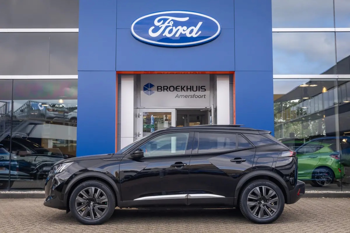 EV GT Pack 50 kWh | (Elektrisch) panorama-dak | Cruise adaptief | Camera | Apple Carplay/Android Auto | Lederen/alcantara bekleding | Stoel verwarming | Keyless | Digitaal dashboard | Achter