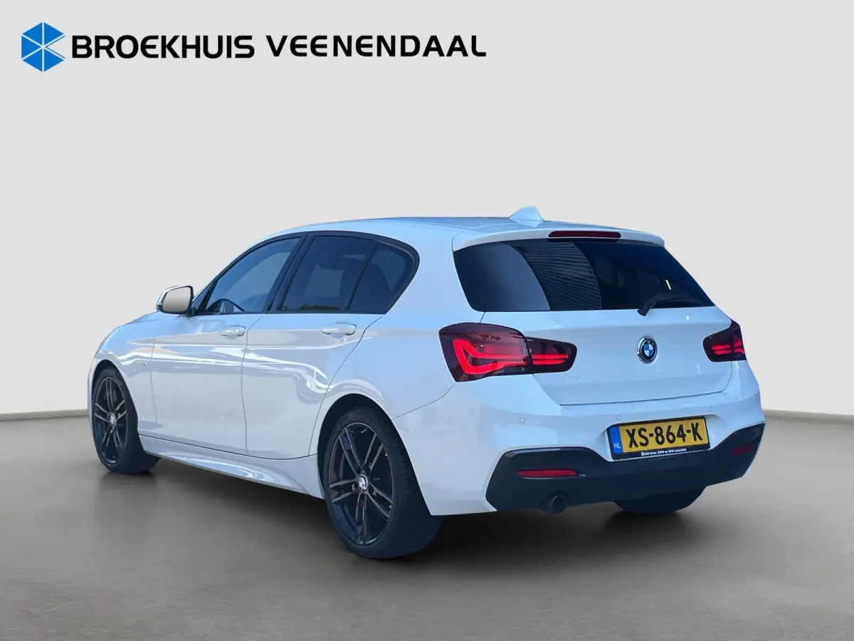 118i High Executive M-Sport | Pano | Cruise Control | Stoelverwarming | Navi | Bluetooth |