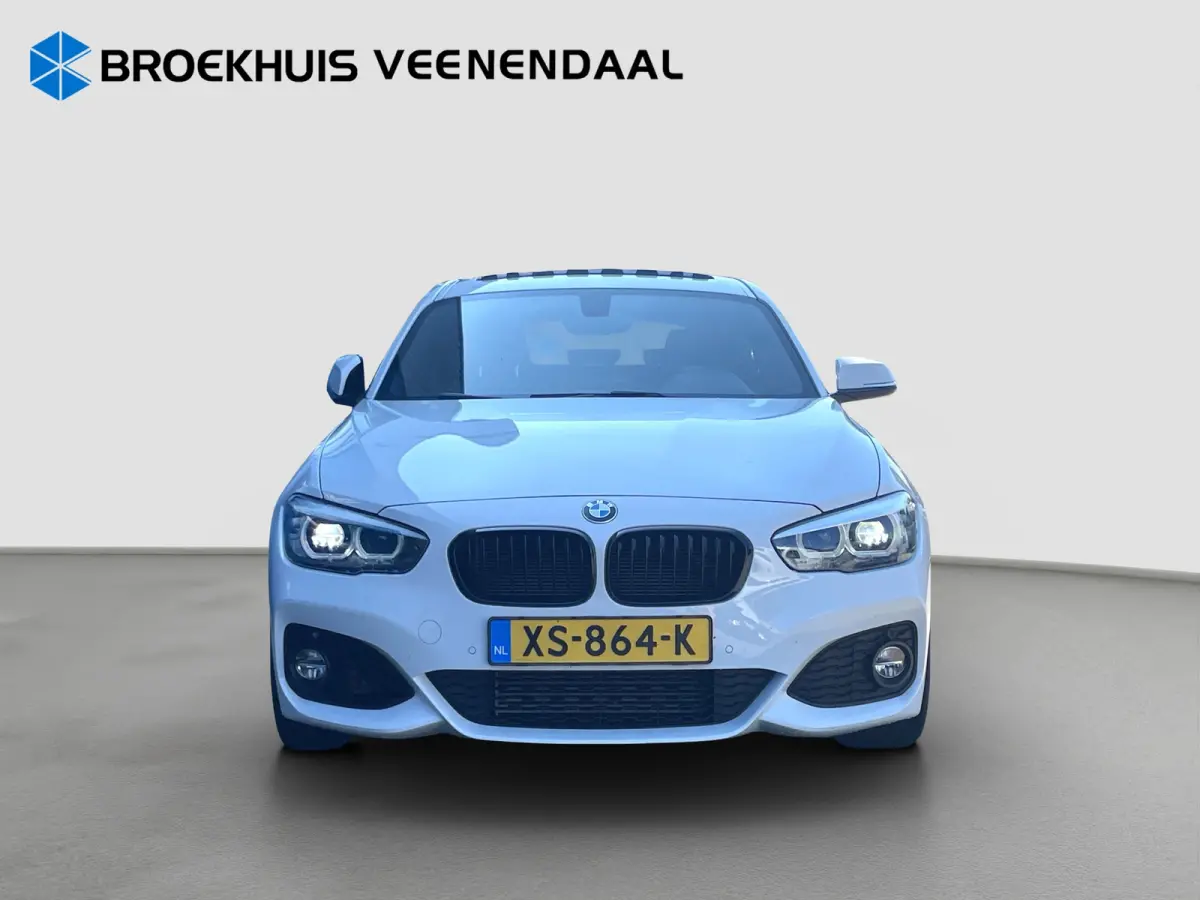 118i High Executive M-Sport | Pano | Cruise Control | Stoelverwarming | Navi | Bluetooth |