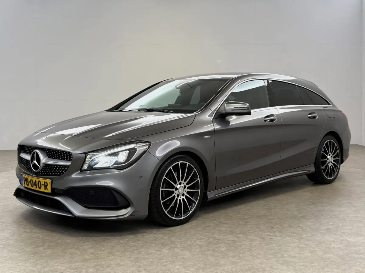 180 Business Solution AMG | Airco | Camera | Cruise | Carplay | LED | Navi | Parkeersens.