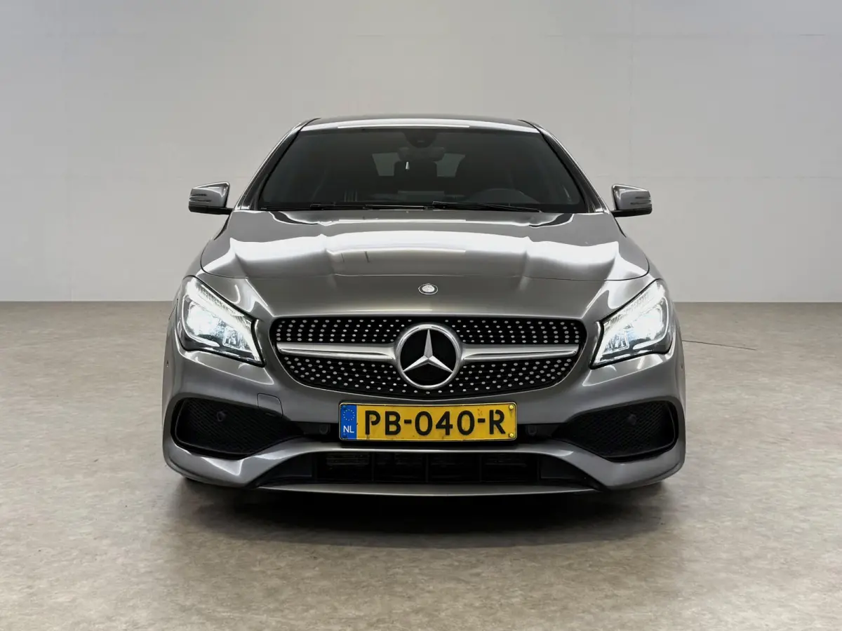 180 Business Solution AMG | Airco | Camera | Cruise | Carplay | LED | Navi | Parkeersens.