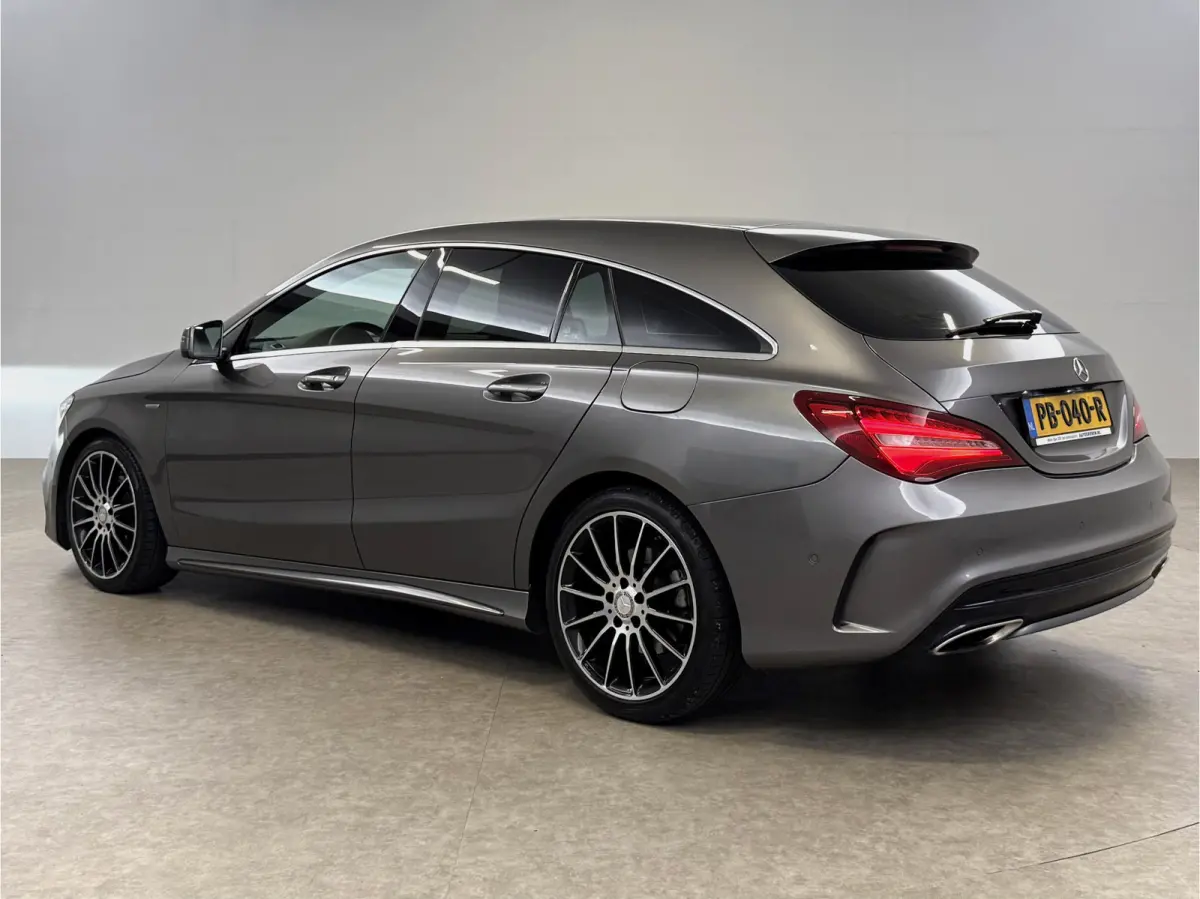 180 Business Solution AMG | Airco | Camera | Cruise | Carplay | LED | Navi | Parkeersens.