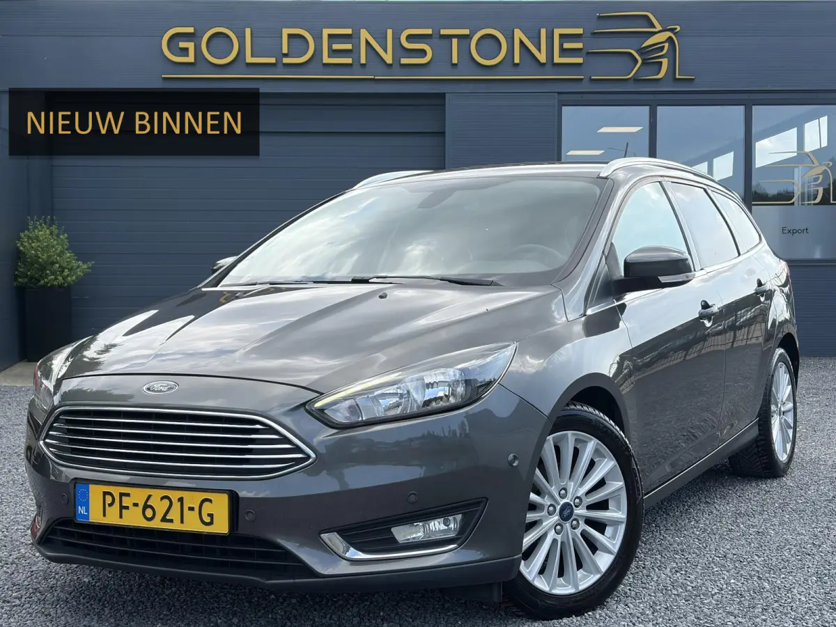 1.0 Titanium 2e Eigenaar,Navi,Trekhaak,125pk,Clima,Cruise,Pdc V+A,6 Bak,Lm velgen,N.A.P,Apk tot 07-2027