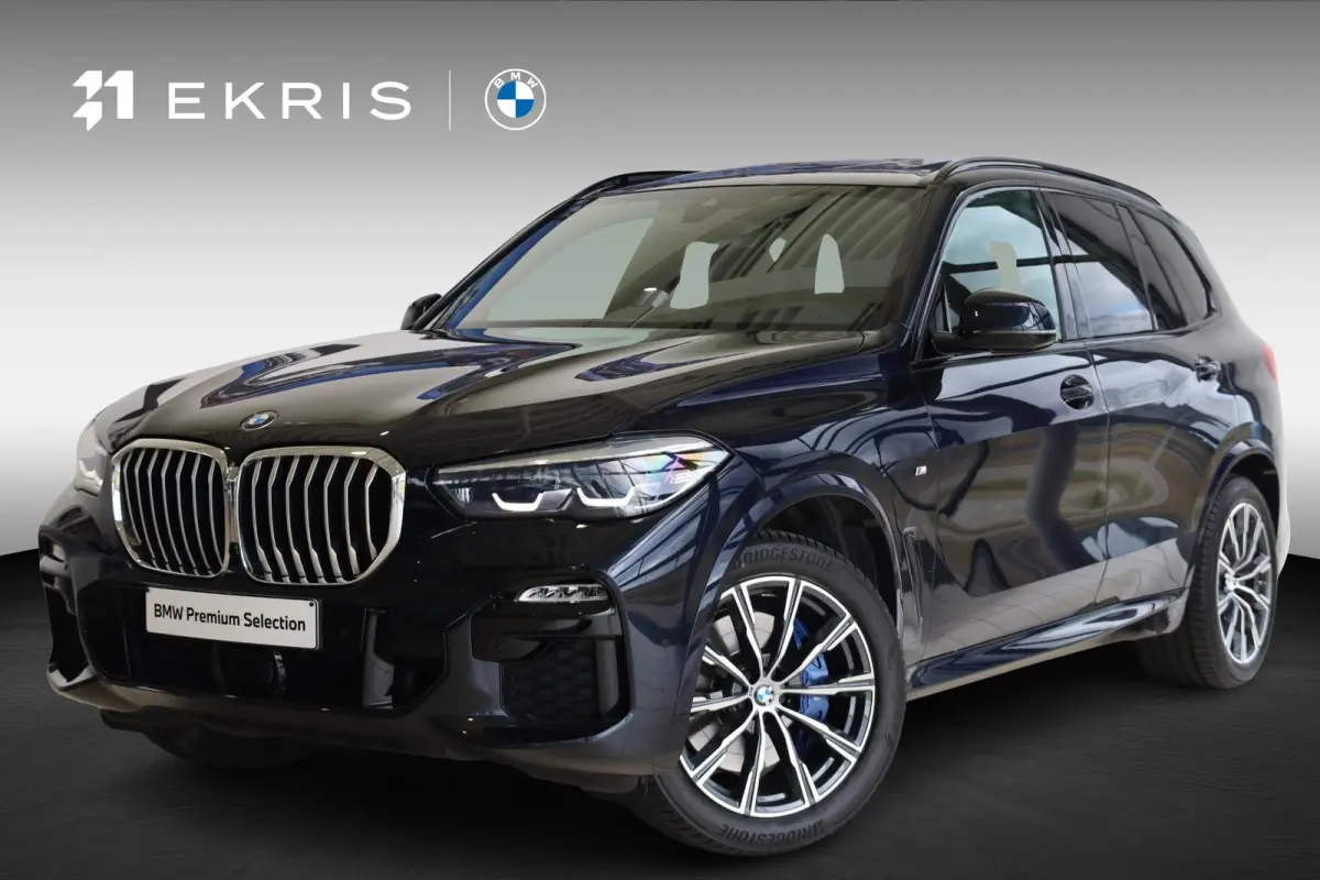 xDrive40i High Executive | M Sportpakket | Panorama Dak | Trekhaak | Stoelverwarming | Parkeersensoren | Achteruitrij Camera