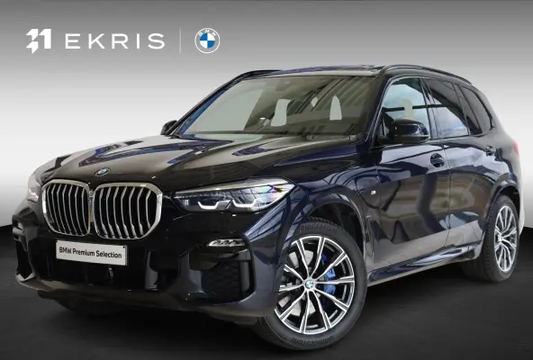 xDrive40i High Executive | M Sportpakket | Panorama Dak | Trekhaak | Stoelverwarming | Parkeersensoren | Achteruitrij Camera