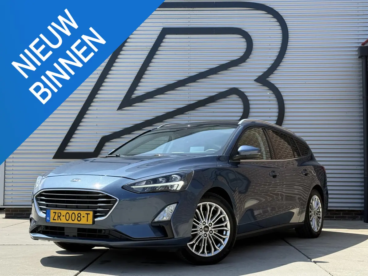1.0 EcoBoost Titanium Business 2e Eigenaar|Pano|Stoel+stuurverw|Adap Cruise|Carplay|HUD|Dealer Onderhouden|Camera|Clima|PDC V+A|Trekhaak|LM velgen|Navi|Elek Ramen|N.A.P.|APK tot 07-2027