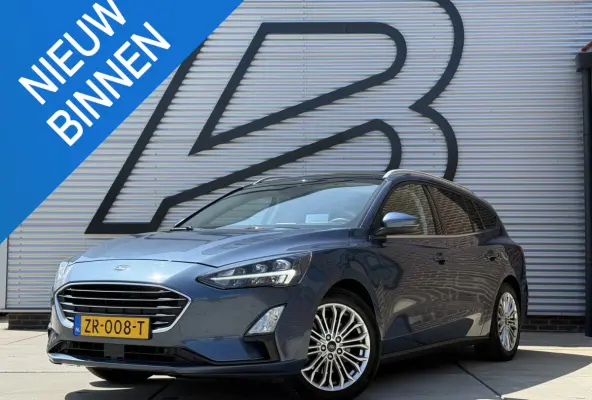 1.0 EcoBoost Titanium Business 2e Eigenaar|Pano|Stoel+stuurverw|Adap Cruise|Carplay|HUD|Dealer Onderhouden|Camera|Clima|PDC V+A|Trekhaak|LM velgen|Navi|Elek Ramen|N.A.P.|APK tot 07-2027