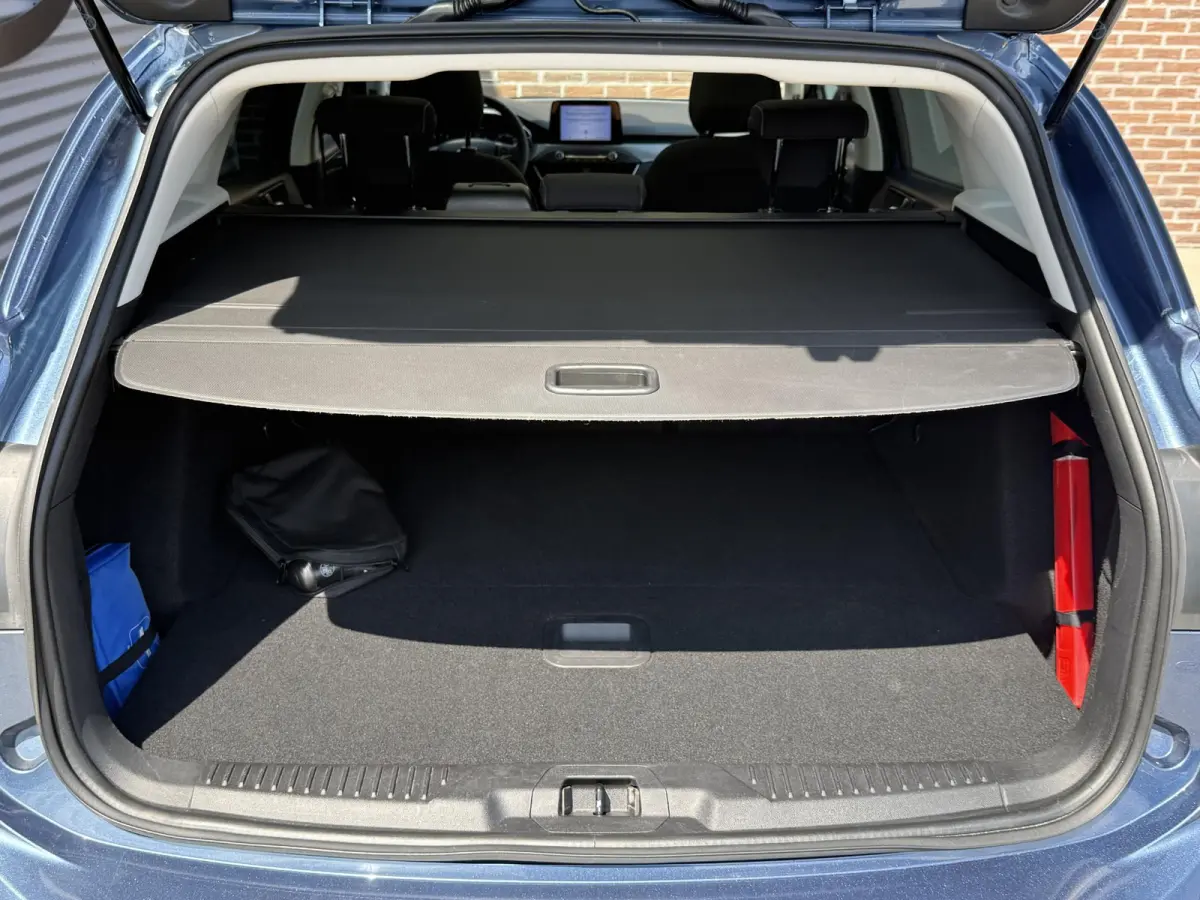 1.0 EcoBoost Titanium Business 2e Eigenaar|Pano|Stoel+stuurverw|Adap Cruise|Carplay|HUD|Dealer Onderhouden|Camera|Clima|PDC V+A|Trekhaak|LM velgen|Navi|Elek Ramen|N.A.P.|APK tot 07-2027