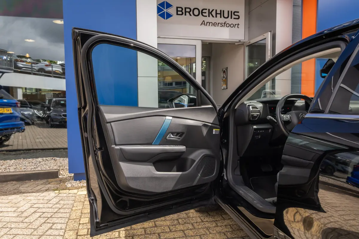 Shine 50 kWh | Cruise adaptief | 18'' | Head-up display | Lederen/stof bekleding | Digitaal dashboard | Camera | Achteruitrijcamera | Apple Carplay/Android Auto|telefoonintegratie premium | 