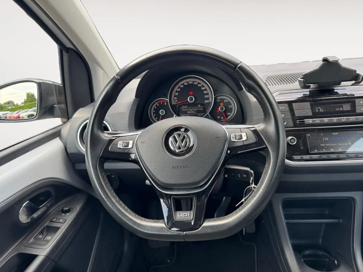 Up! 1.0 TSI BMT cross up! | Parkeercamera | Stoel + Stuurverwarming | Climate control | Bluetooth | Lm-velgen