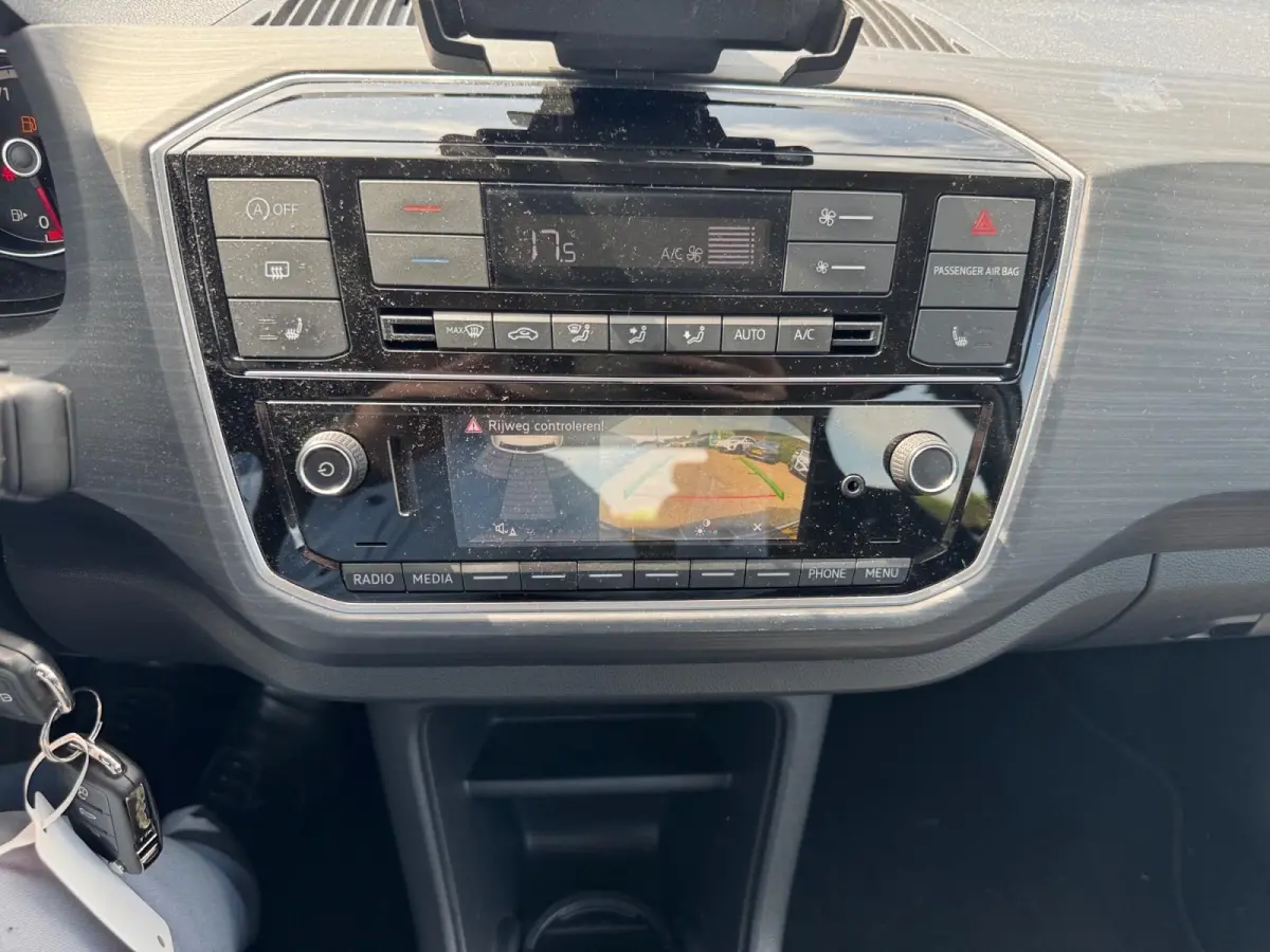 Up! 1.0 TSI BMT cross up! | Parkeercamera | Stoel + Stuurverwarming | Climate control | Bluetooth | Lm-velgen