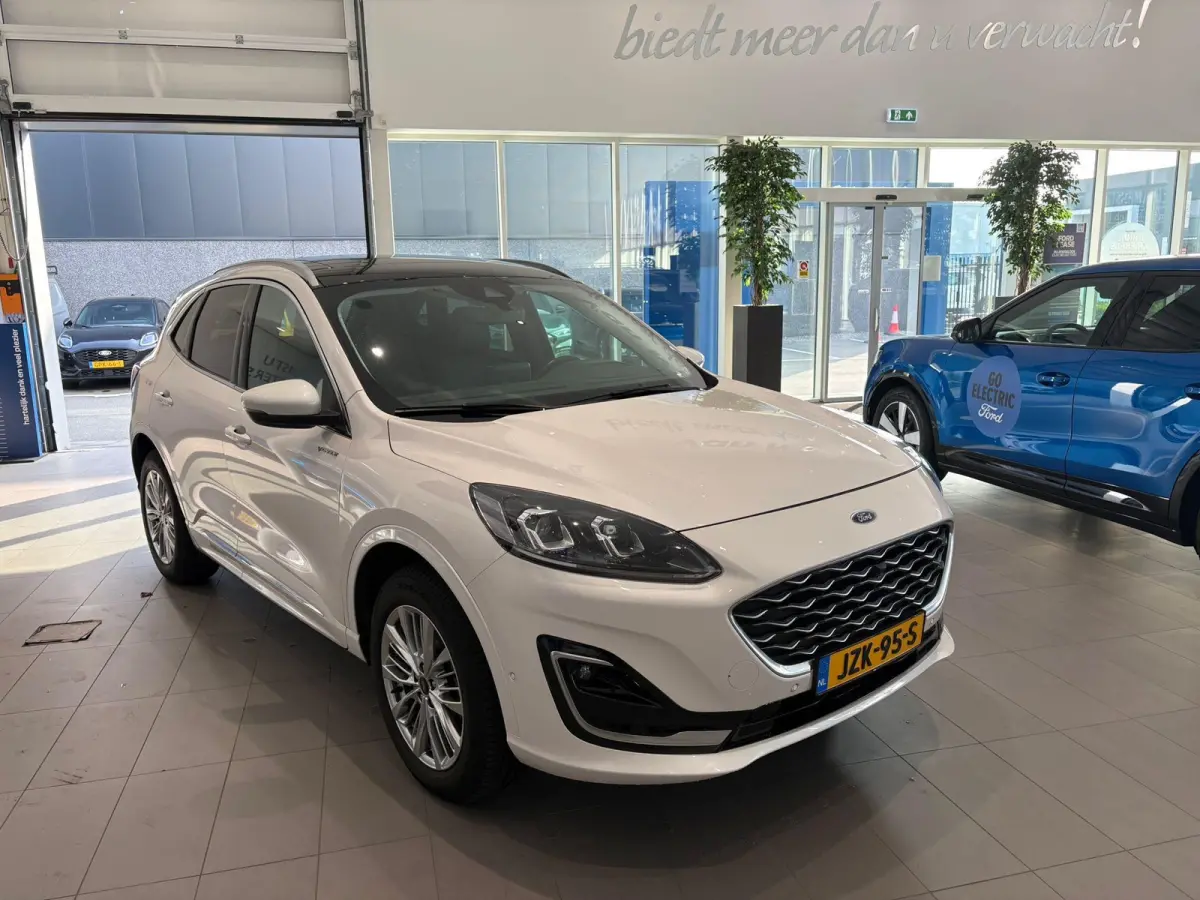 2.5 PHEV Vignale TREKHAAK | VIGNALE | LEDERE STOELEN | ELEKTRISCHE STOELEN MET MEMORY | ADAPTIVE CRUISE CONTROL | NAVIGATIE | HEAD-UP DISPLAY | PANORAMA DAK | ACHTERRUITRIJCAMERA