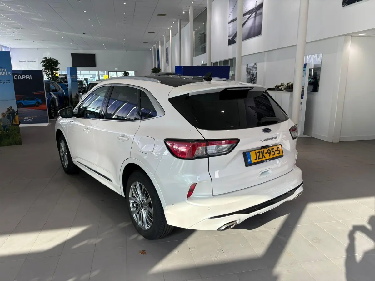 2.5 PHEV Vignale TREKHAAK | VIGNALE | LEDERE STOELEN | ELEKTRISCHE STOELEN MET MEMORY | ADAPTIVE CRUISE CONTROL | NAVIGATIE | HEAD-UP DISPLAY | PANORAMA DAK | ACHTERRUITRIJCAMERA