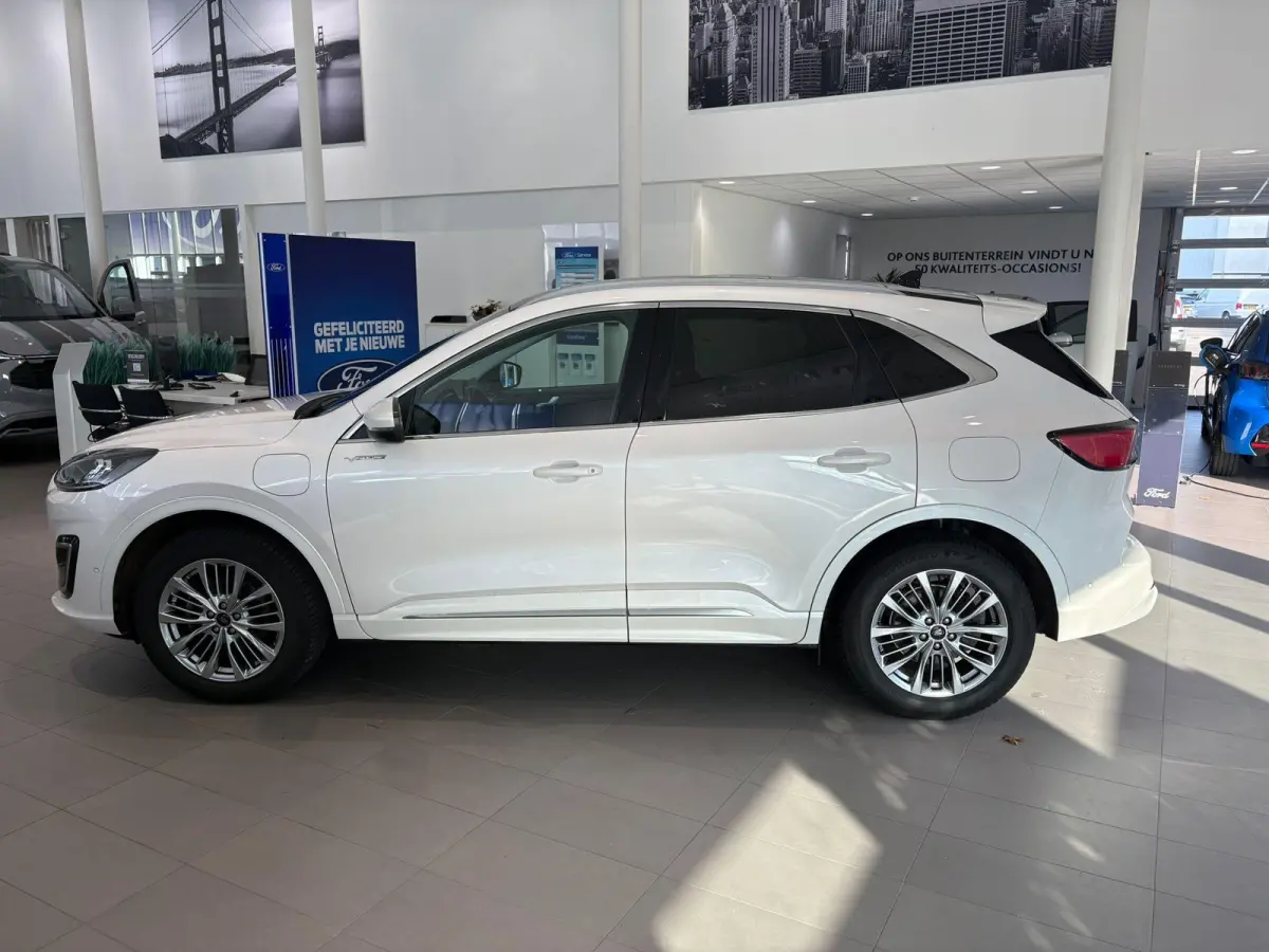 2.5 PHEV Vignale TREKHAAK | VIGNALE | LEDERE STOELEN | ELEKTRISCHE STOELEN MET MEMORY | ADAPTIVE CRUISE CONTROL | NAVIGATIE | HEAD-UP DISPLAY | PANORAMA DAK | ACHTERRUITRIJCAMERA