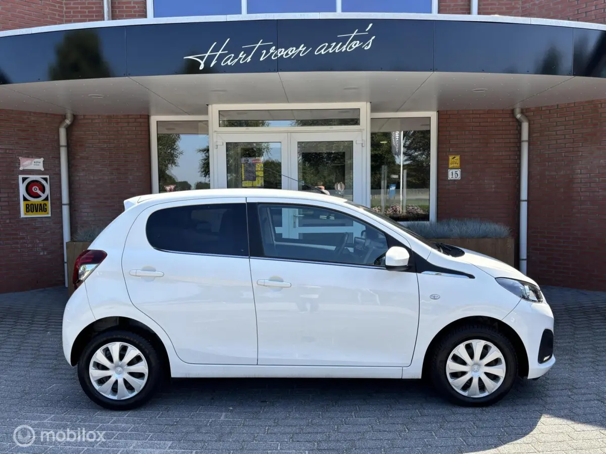 1.0 e-VTi Active | Airco | Bluetooth | Privacy glas |