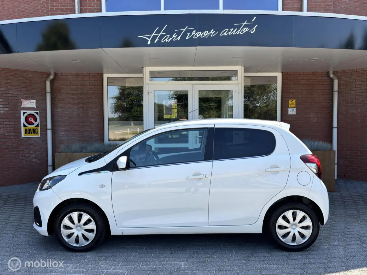 1.0 e-VTi Active | Airco | Bluetooth | Privacy glas |