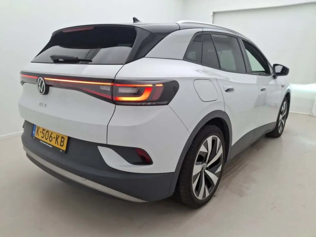 First 77 kWh 204 PK| Origineel Nederlands | Navigatie | Achteruitrijcamera | Parkeersensoren | Stoelverwarming | Stuurwielverwarming | Climatronic