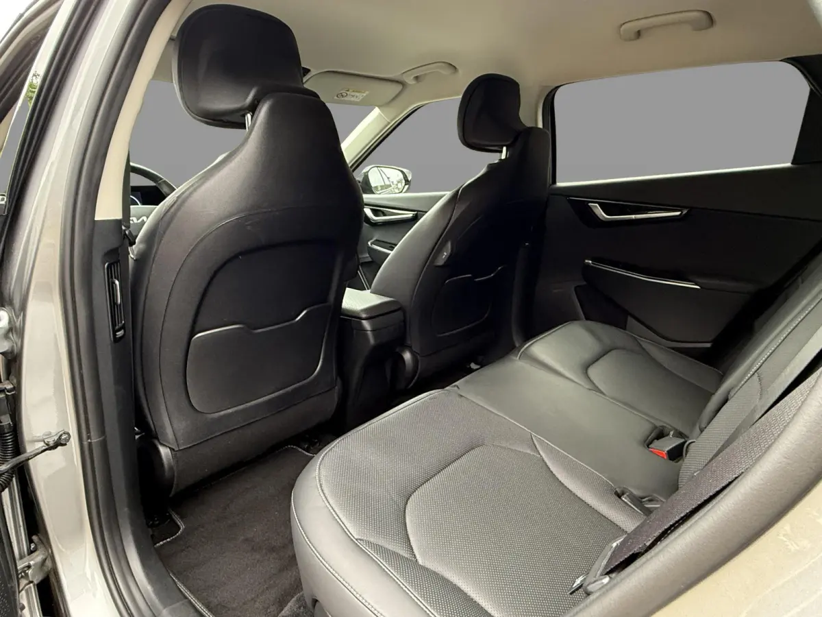 Plus 77.4 kWh SOH 97,7% / Black Package GT / Warmtepomp / Trekhaak / 3 Fase / Stoelverwarming & Ventilatie / MERIDIAN Surround-System / Adaptieve Cruise /