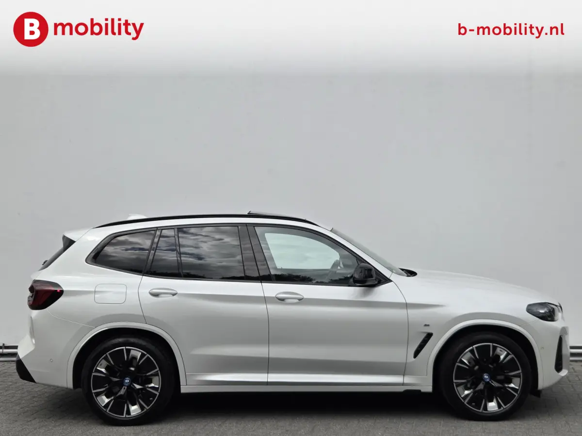 High Executive 80 kWh M-Sport 'Mineral-Weiss' Trekhaak Panoramadak | Head-Up | Harman/Kardon | Adaptive LED | ACC | DAB