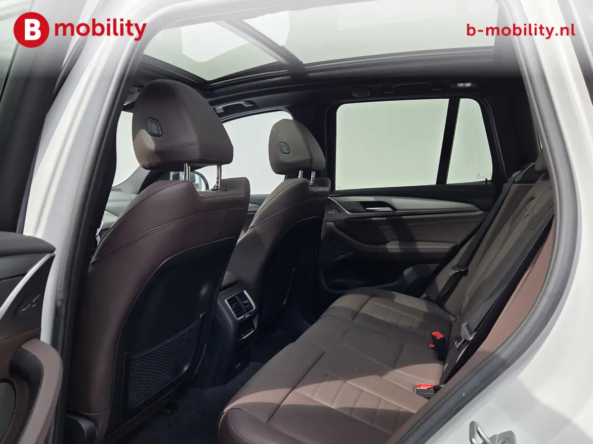 High Executive 80 kWh M-Sport 'Mineral-Weiss' Trekhaak Panoramadak | Head-Up | Harman/Kardon | Adaptive LED | ACC | DAB