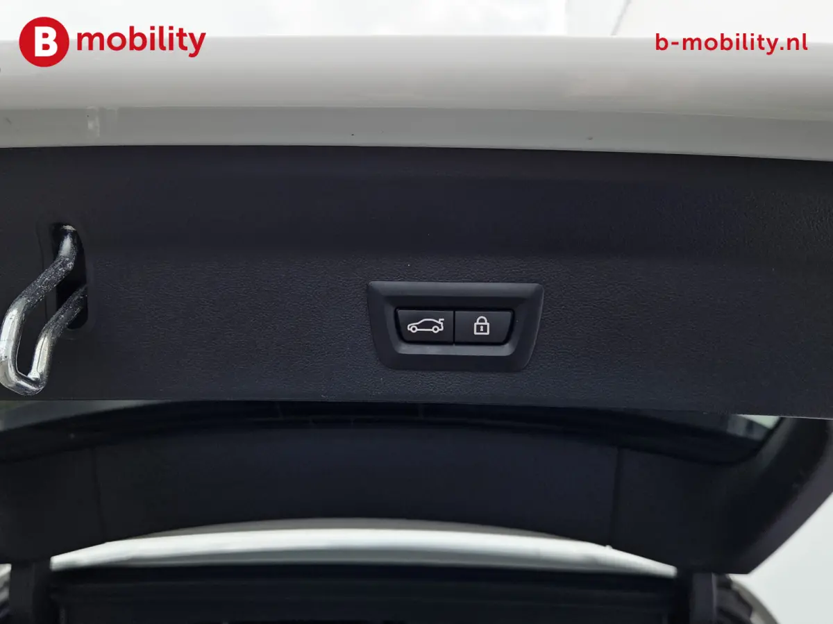 High Executive 80 kWh M-Sport 'Mineral-Weiss' Trekhaak Panoramadak | Head-Up | Harman/Kardon | Adaptive LED | ACC | DAB