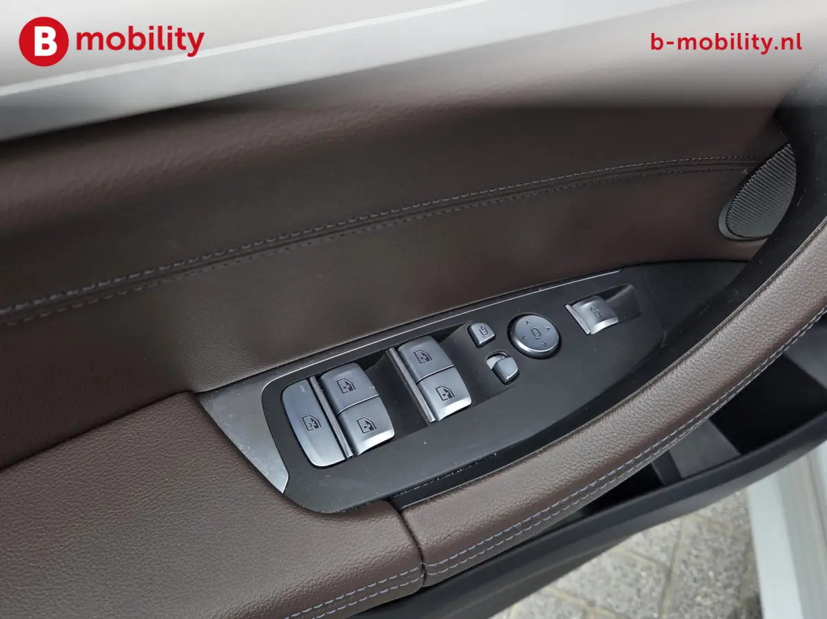 High Executive 80 kWh M-Sport 'Mineral-Weiss' Trekhaak Panoramadak | Head-Up | Harman/Kardon | Adaptive LED | ACC | DAB