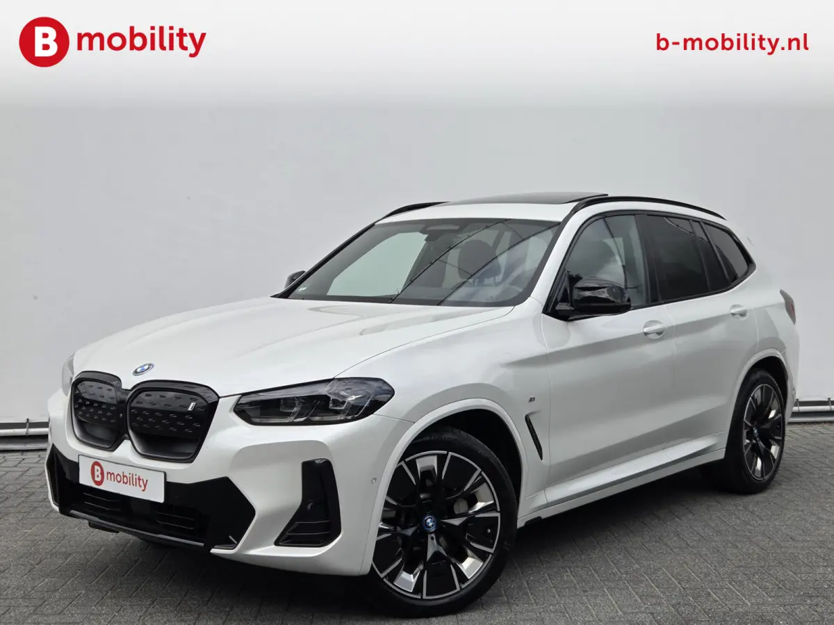 High Executive 80 kWh M-Sport 'Mineral-Weiss' Trekhaak Panoramadak | Head-Up | Harman/Kardon | Adaptive LED | ACC | DAB