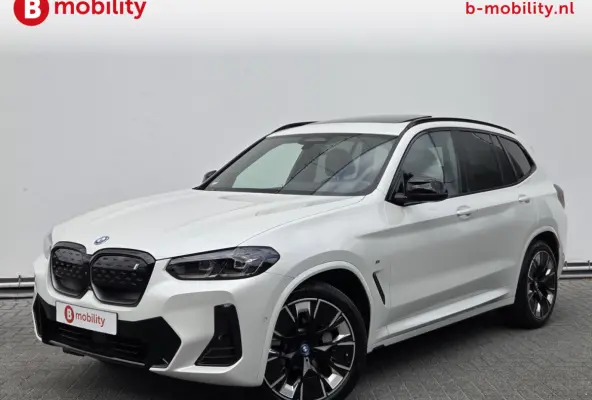 High Executive 80 kWh M-Sport 'Mineral-Weiss' Trekhaak Panoramadak | Head-Up | Harman/Kardon | Adaptive LED | ACC | DAB