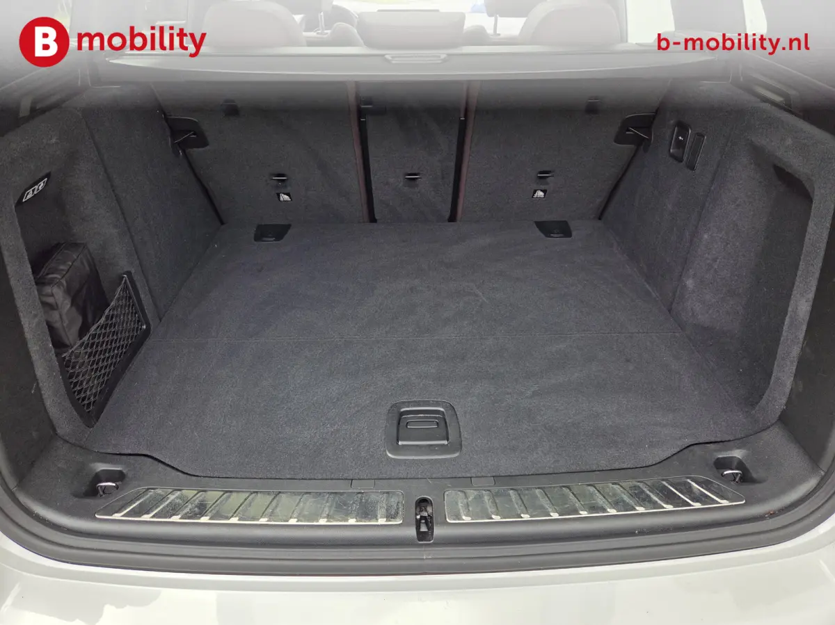 High Executive 80 kWh M-Sport 'Mineral-Weiss' Trekhaak Panoramadak | Head-Up | Harman/Kardon | Adaptive LED | ACC | DAB