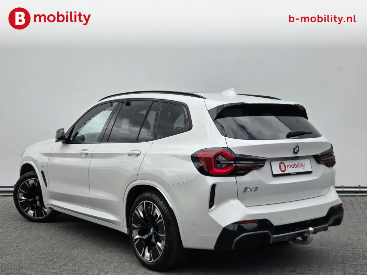 High Executive 80 kWh M-Sport 'Mineral-Weiss' Trekhaak Panoramadak | Head-Up | Harman/Kardon | Adaptive LED | ACC | DAB