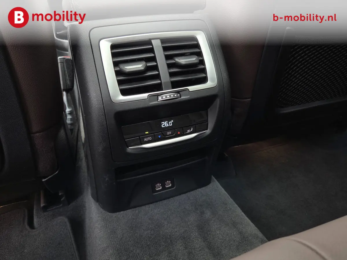 High Executive 80 kWh M-Sport 'Mineral-Weiss' Trekhaak Panoramadak | Head-Up | Harman/Kardon | Adaptive LED | ACC | DAB